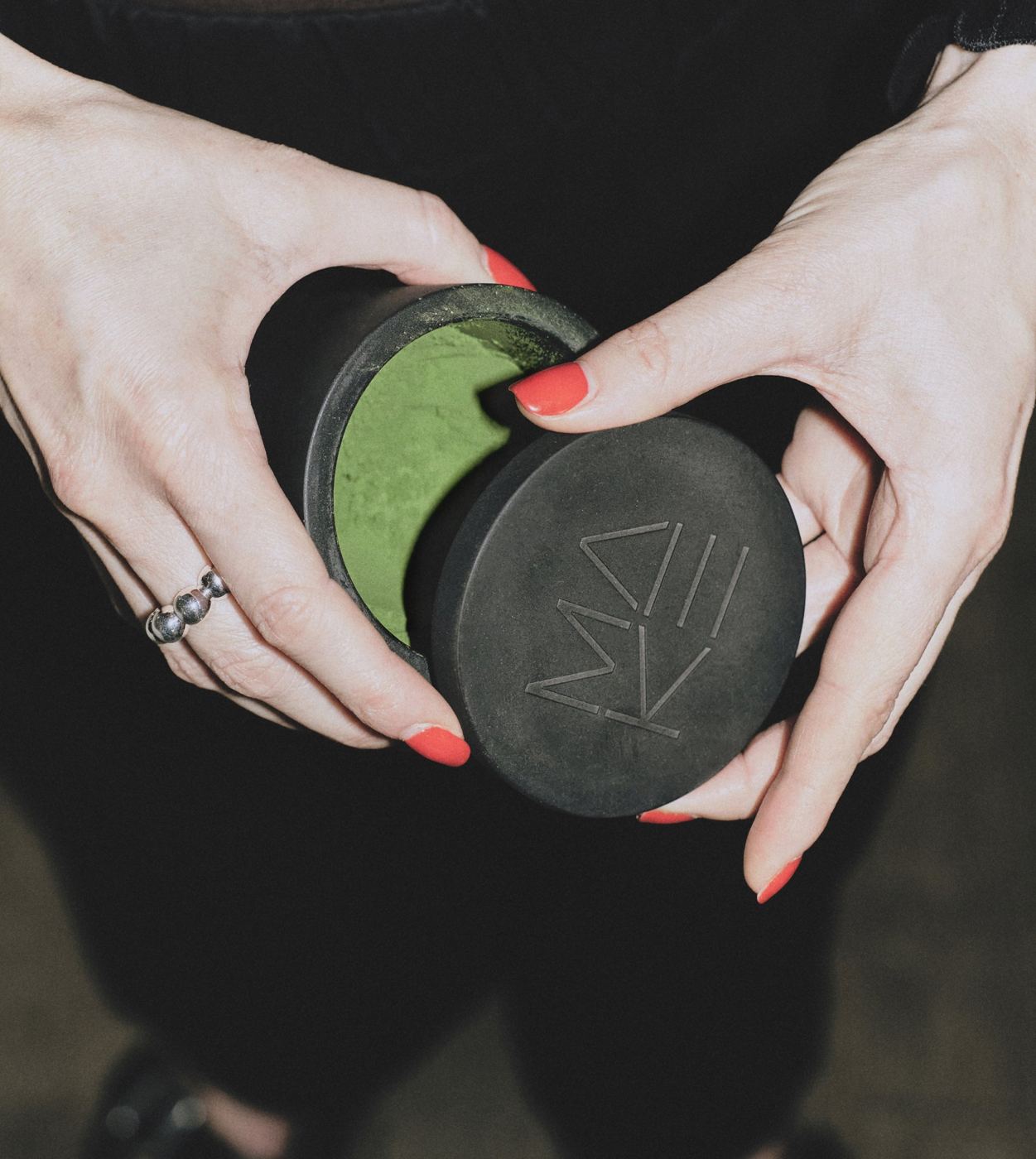 The MAKE stone tea caddy in hand